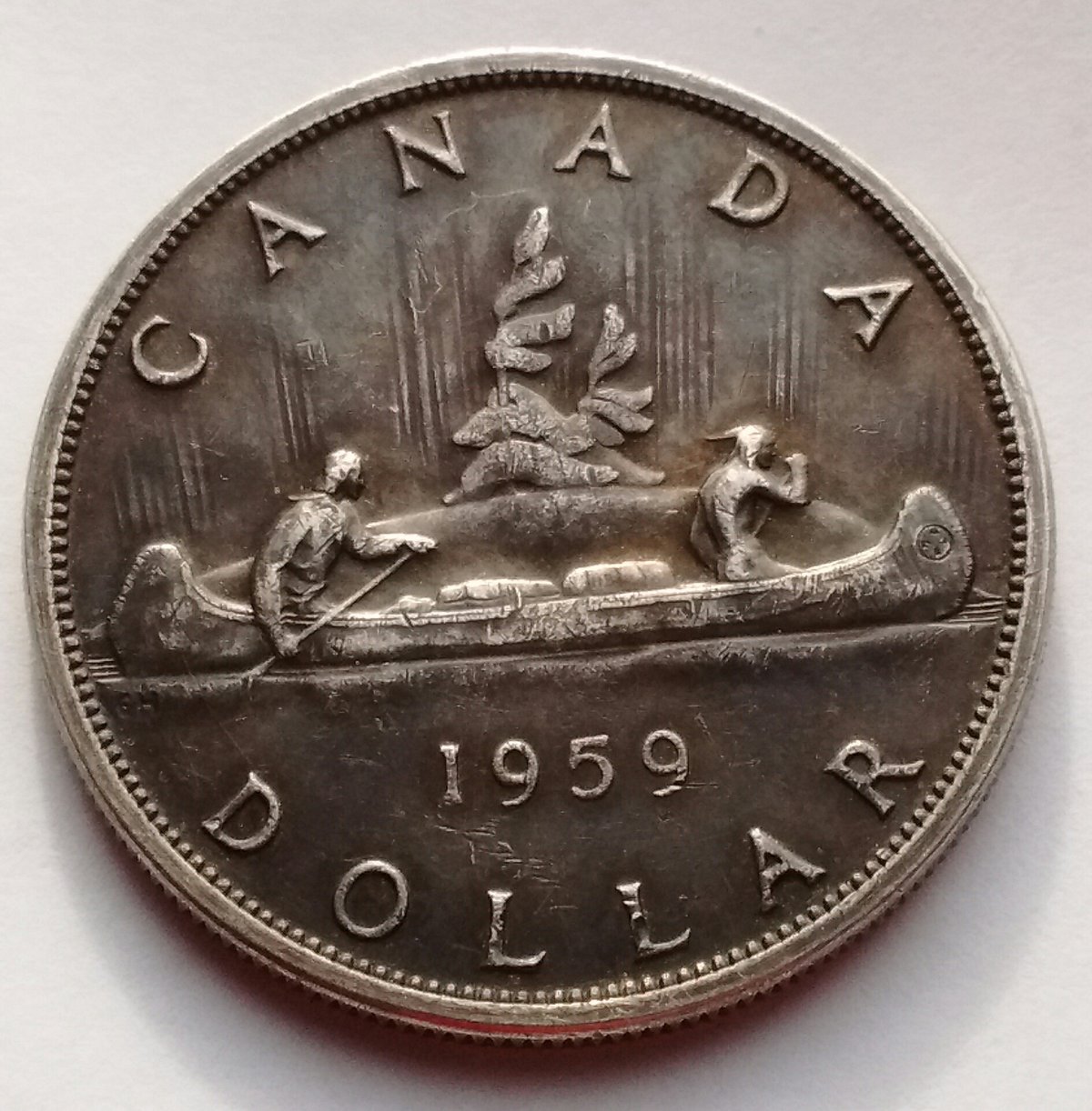 Can-You-Please-Grade-My-Toned?-1959-Canada-One-Dollar?